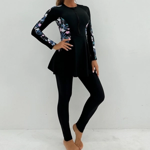 Detail of modest modest long sleeve swimwear with floral print and zipper design