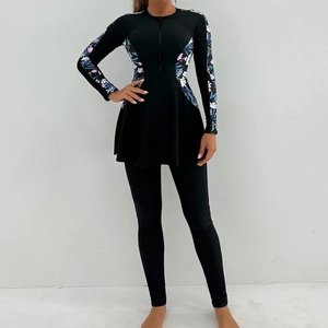 Front detail of long-sleeve modest burkini with zipper and floral print panels