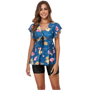 Detail of floral V-neck tankini top with drawstring and black high-stretch bikini shorts