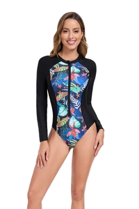 Detail of long-sleeve swimsuit featuring tropical floral prints and front zipper closure