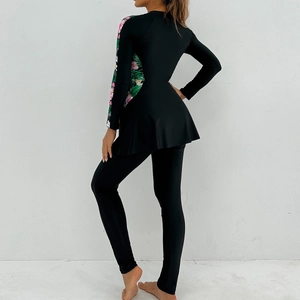Side view of long-sleeved modest burkini swimwear with floral patterns and leggings