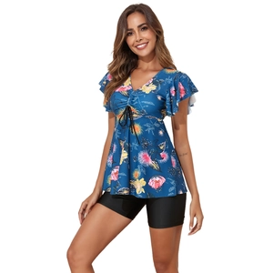 Close-up of floral print V-neck tankini top with drawstring and ruffled sleeves