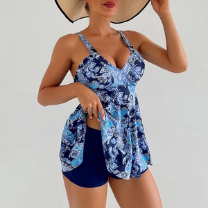 Detail of blue paisley tankini top with V-neckline and matching swim shorts for women