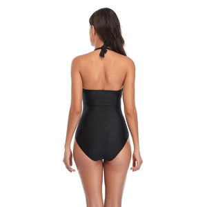 Back view of black halter neck one-piece swimsuit with backless tie design and high stretch fabric