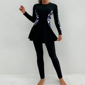 Modest black long-sleeve burkini swim suit with floral patterns and a front zipper