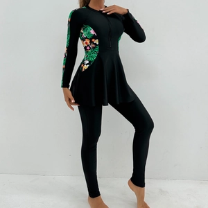Women's long sleeve modest swimsuit with tropical floral print and sun protection