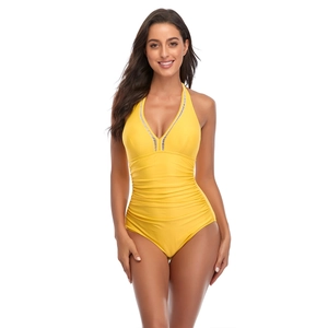 Close-up of bright yellow one-piece swimsuit with V-neck and striped trim detail