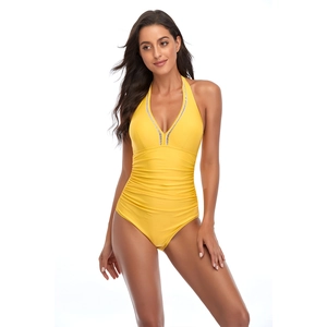 Detailed view of yellow V-neck one-piece swimsuit with ruching and contrast trim