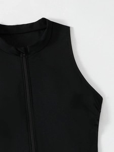 Close-up of front zipper and collar stitching on high-elastic black athletic swimwear