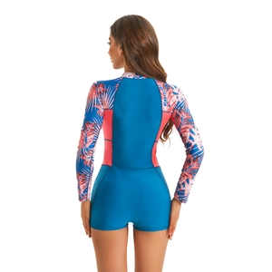 Rear view of long sleeve surf swimsuit featuring pink tropical palm leaf printed sleeves