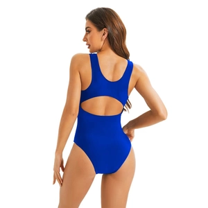 Detail of royal blue one-piece swimsuit featuring a cut-out back and racerback design
