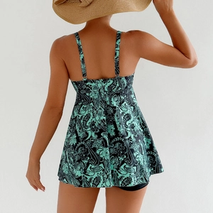 Rear view of a paisley print tankini swim dress with adjustable straps and flared skirt
