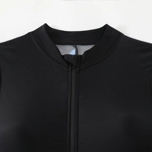 Detail of high-stretch athletic swimwear neckline with a durable zipper and stand collar