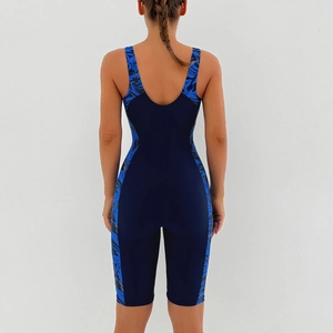 Detailed back view of navy athletic swimsuit with tropical leaf print and U-back design