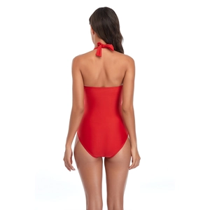Rear view of red halter neck one-piece swimsuit with bow tie and open back design