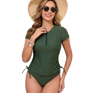 Women's dark green two-piece swimsuit with short sleeve zipper top and side drawstring