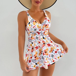 Detail of floral butterfly print on V-neck skirted swimsuit with twisted chest design