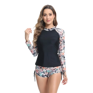 Women's two-piece floral long sleeve surfing swimsuit with side-tie bikini bottom