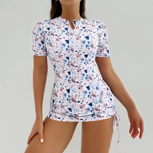 Maillot de surf à fleurs manches courtes avec zip avant et cordon de serrage latéral