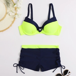 Detail of neon yellow bikini top with underwire and blue drawstring high waist shorts