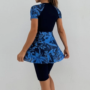 Back view of short-sleeve split swimsuit with floral print and skirted leggings