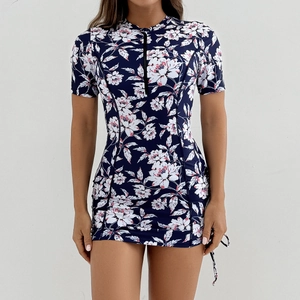 Maillot de surf à manches courtes avec motif floral et fermeture éclair sur le devant