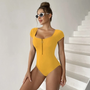 Detail of yellow ribbed one-piece swimsuit featuring front zipper and square neckline