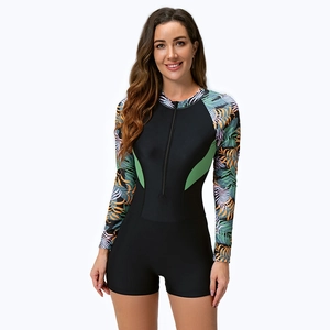 Close-up of tropical leaf print sleeves and front zipper on long sleeve surfing swimsuit