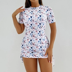 Maillot de bain de sport à fleurs manches courtes avec fermeture éclair et cordons latéraux