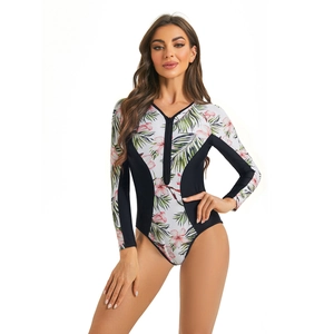 Floral long sleeve swimsuit detail with tropical print and black slimming side panels