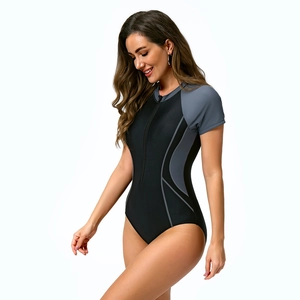 Detail of slim-fit one-piece swimsuit with front zipper and athletic color-block design