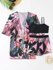 Detailed flat lay of three-piece tropical floral bikini set with kimono cover-up and accessories
