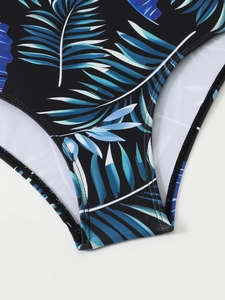 Détails du tissu de maillot de bain avec imprimés de feuilles tropicales et doubles coutures