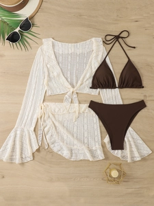 Flat lay of a 4-piece swimwear set with brown bikini and white floral lace cover-up