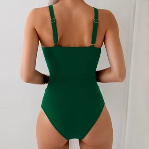 Back view of dark green one-piece swimsuit featuring adjustable thin straps and high-cut leg