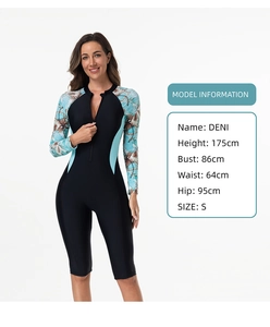 Front zipper detail of long sleeve swimsuit with floral print and blue accents