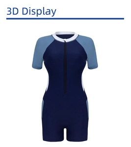 Close-up of short sleeve one-piece swimsuit with front zipper and blue patchwork design