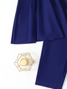 Detail of dark blue short-sleeved swimwear fabric with gold decorative accents