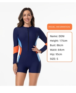 Detail of long sleeve surfboard swimsuit with contrast side panels and front zipper