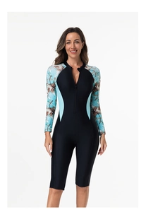 Detail of floral printed sleeves and front zipper on long sleeve one-piece swimsuit