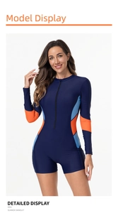 Close-up of long sleeve surfing swimsuit with zipper and contrasting side panels