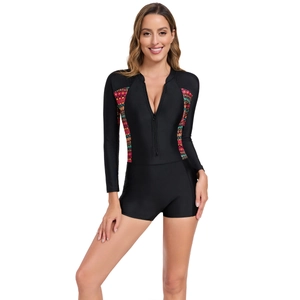 Maillot de bain une pièce à manches longues pour femmes avec zip et motifs latéraux