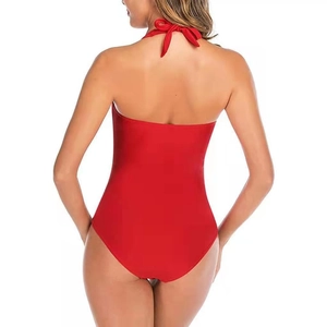 Back view of a sexy red halter one-piece swimsuit with ribbon tie and slim fit cut