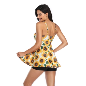 Back view of sunflower print tankini top with black boyshorts swimsuit bottoms
