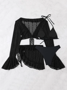 Detailed view of black four-piece bikini set with lace cover-up and geometric hollow patterns