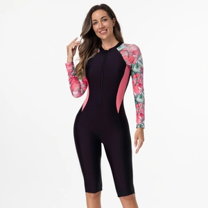 Detail of long sleeve floral print swimsuit with front zipper and slim pink waistlines