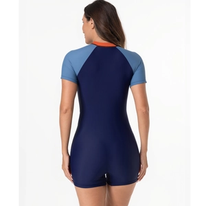 Rear view of short sleeve one-piece surfing swimsuit with blue color-block design
