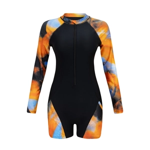 Long-sleeve one-piece swimsuit with vibrant abstract print and front zipper closure