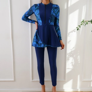 Maillot de surf à manches longues avec imprimé tropical bleu et bas à jupe