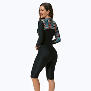 Close-up of the long sleeve rash guard with ethnic geometric prints and black zipper design